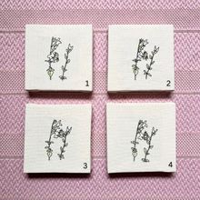 Load image into Gallery viewer, 4 pieces of textile work featuring a bee on a flower, laid in a grid on a pink rug, each is labelled 1-4
